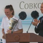 Vladimir Putin giving out prizes